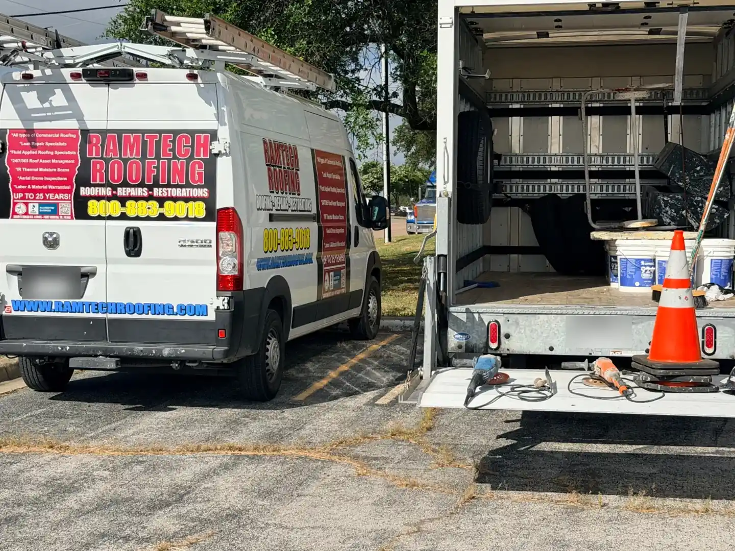 Ramtech service van beside an open work truck loaded with ladders, materials, and tools
